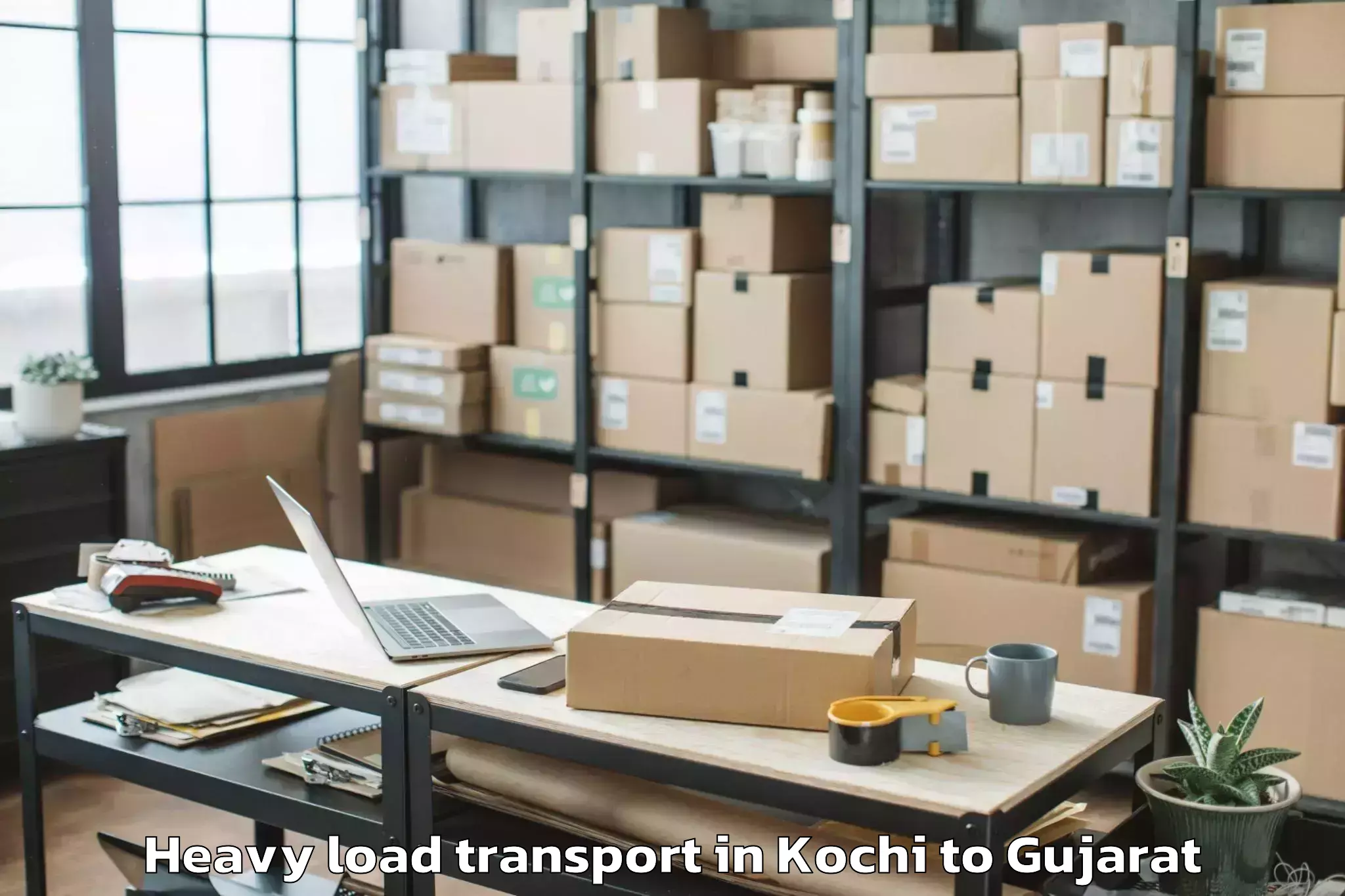 Book Kochi to Lunawada Heavy Load Transport Online